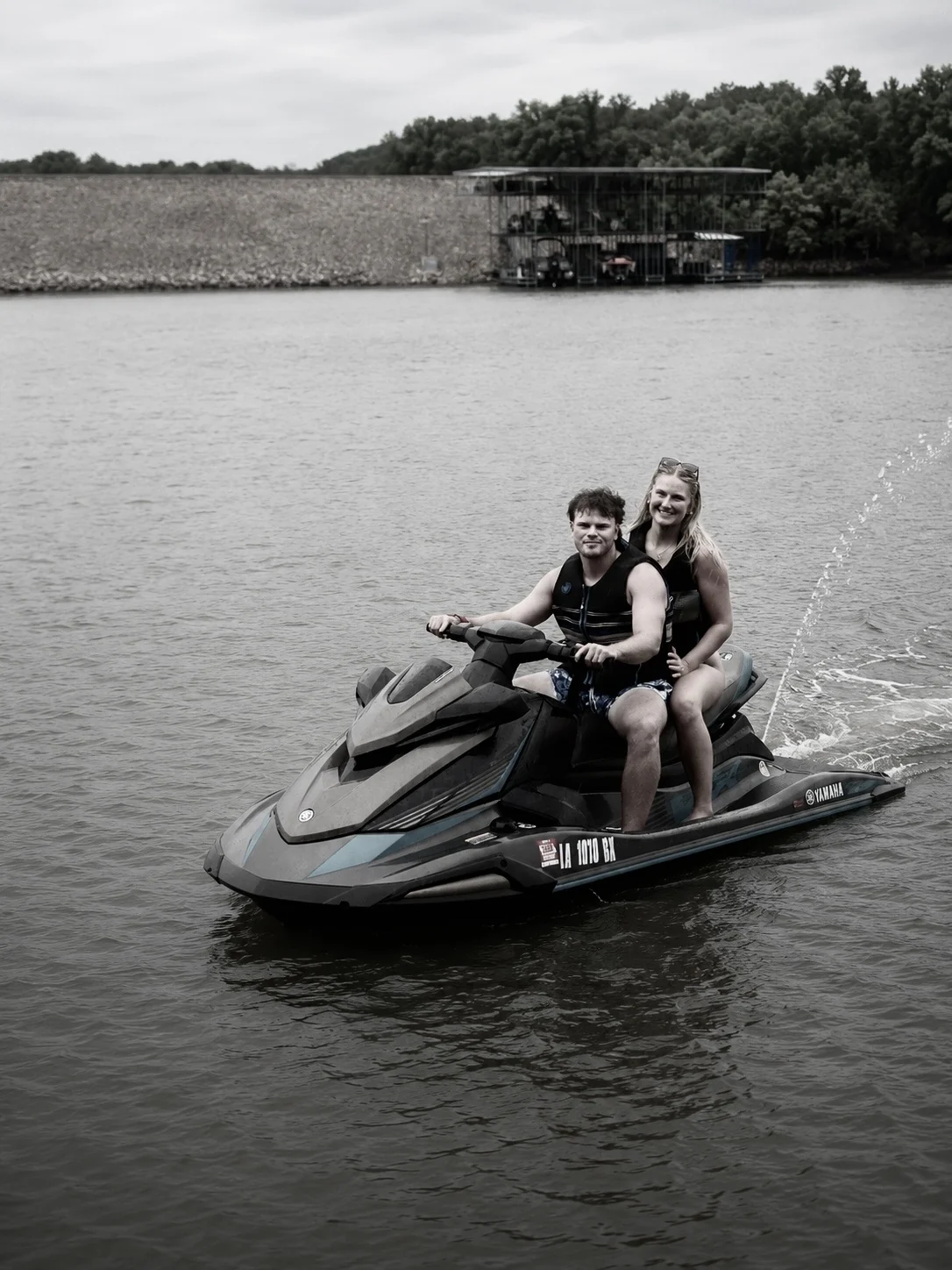 Jacob and his girlfriend riding a jet ski